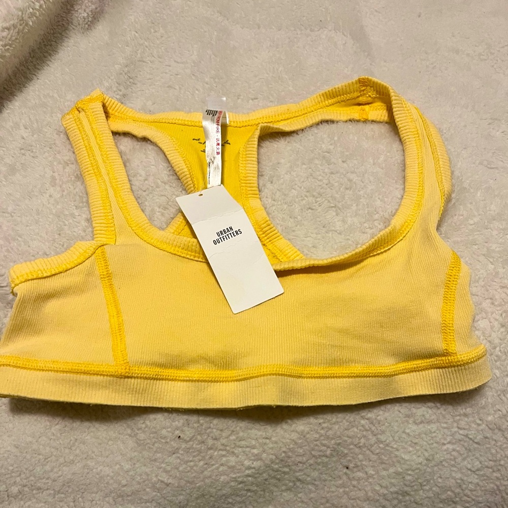 Urban Outfitters • New With Tag • Out from under yellow bra• M/L • Never worn